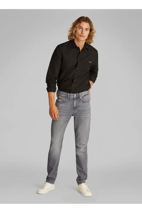 شلوار جین مردانه Calvin Klein Jeans مدل Normal Bel Slim Tapered کد J30J3275401BZ