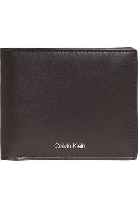کیف پول مردانه Calvin Klein قهوهای تیره با لوگوی برند مناسب استفاده روزمره