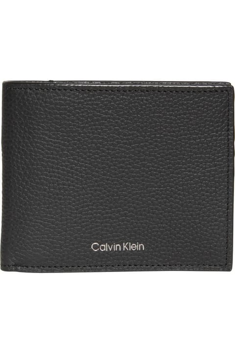 کیف پول مردانه چرم مشکی تخت Calvin Klein مدل LV04D1062G-UB1 با جاکارتی و محفظه اسکناس